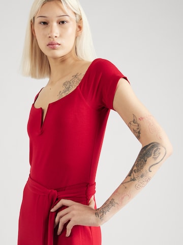 Tuta jumpsuit 'Tenea' di ABOUT YOU in rosso