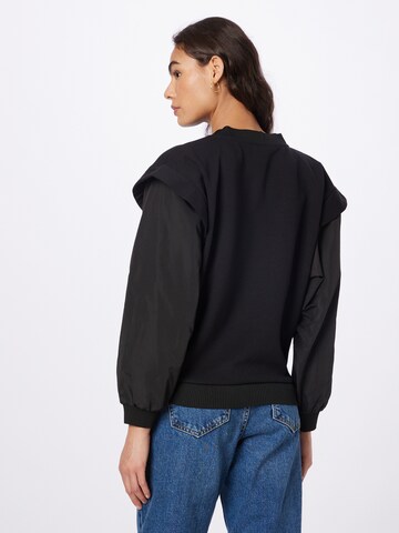 Sisley Sweatshirt in Schwarz