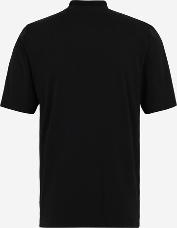 T-Shirt fonctionnel Reebok en noir