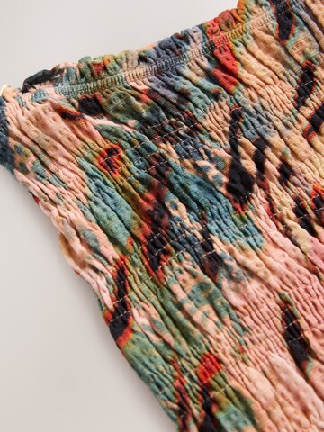 Combinaison Next en vert