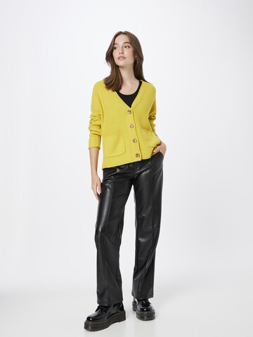 Cartoon Strickjacke in Gelb