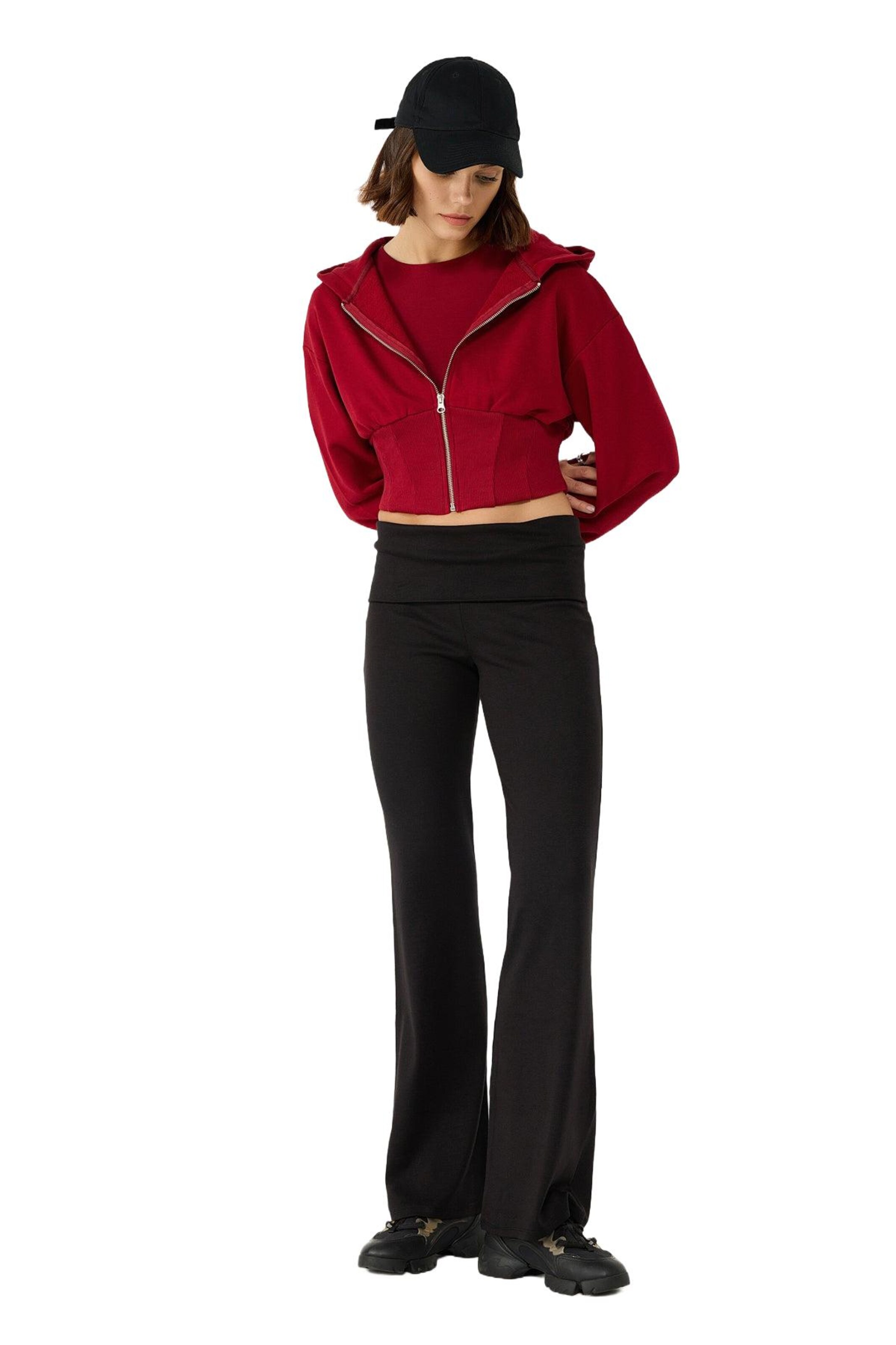 Alexa Dash Flared Trousers in Black: front