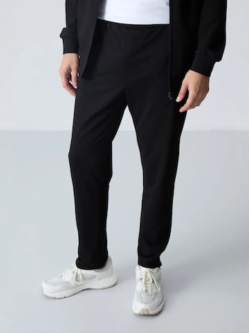 Tommy Life Jogging ruhák 'Aktive Sets' - fekete