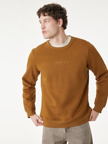 Koton Sweatshirt in Geel: voorkant