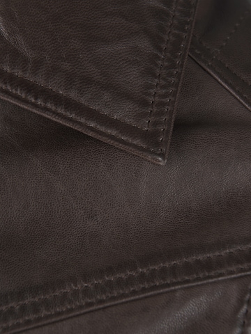 JCC Tussenjas in Bruin