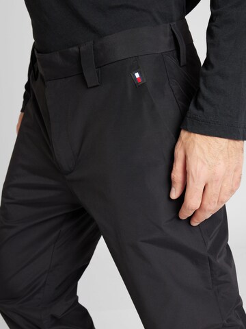 Tommy Jeans Regular Trousers 'DAD' in Black