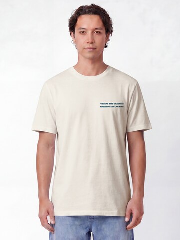 Watapparel Shirt 'Escape The Ordinary' in Wit: voorkant