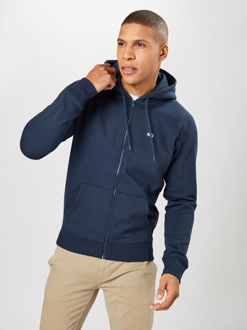 Tommy Jeans - Ajuste regular Sudadera con cremallera en azul: frente