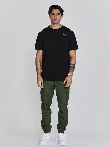 Tapered Pantaloni cargo di SikSilk in verde
