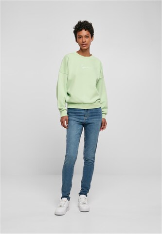 Karl Kani Sweatshirt in Groen