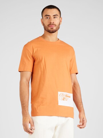 Calvin Klein Jeans - Camisa 'STENCIL' em laranja: frente