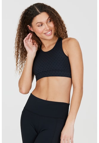 Athlecia Medium Support Urheilurintaliivit 'Tiya' värissä musta: etupuoli