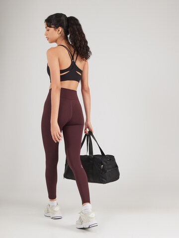 Skinny Pantaloni sportivi 'Pulse' di Hummel in marrone