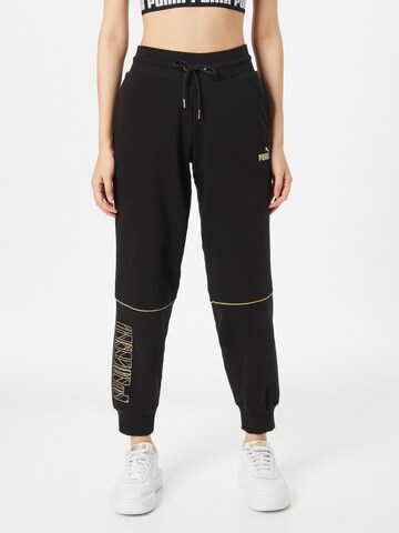 Effilé Pantalon de sport PUMA en noir : devant