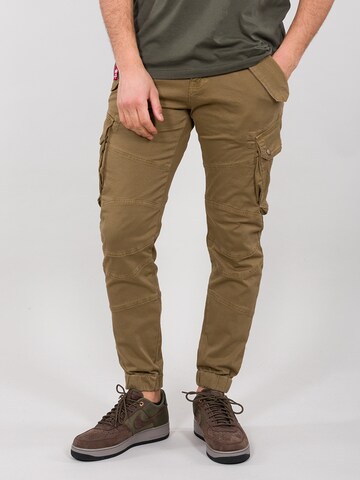 ALPHA INDUSTRIES Tapered Cargobroek 'Combat' in Groen: voorkant