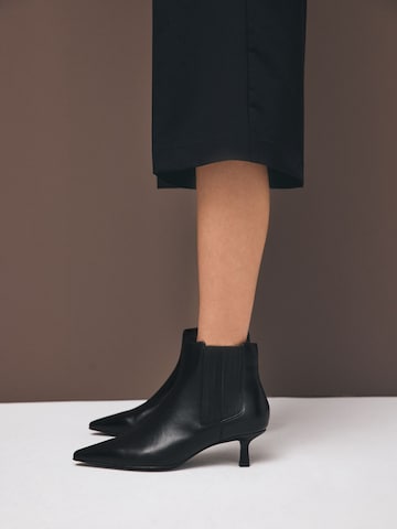 Ankle boots 'Motion Flex' di Next in nero