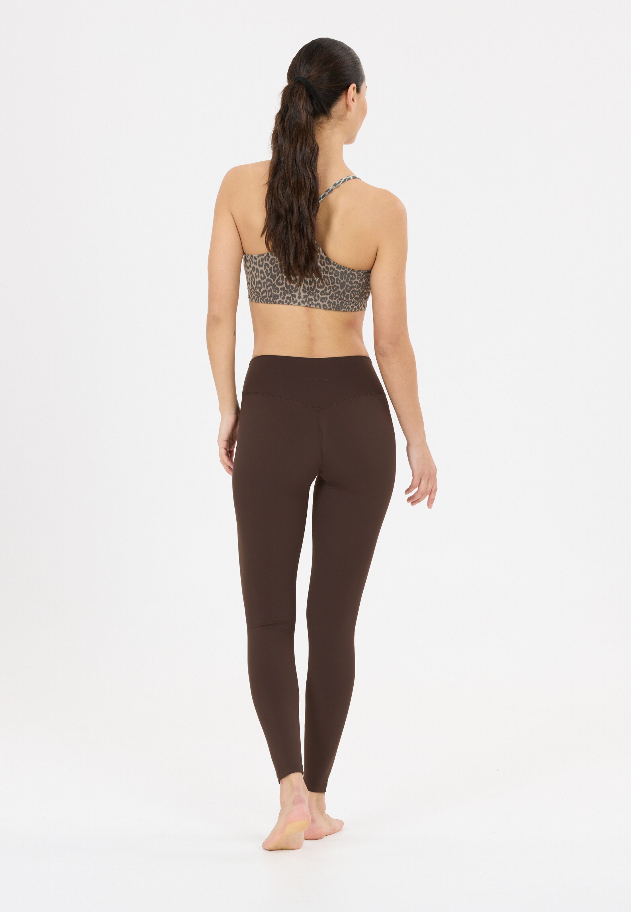 Athlecia Skinny Sports trousers 'Emarri' in Brown