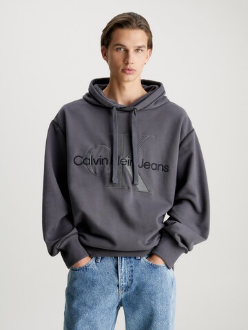 Sweat-shirt Calvin Klein Jeans en gris : devant