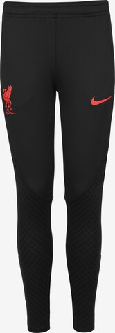 NIKE Skinny Workout Pants in Black: front