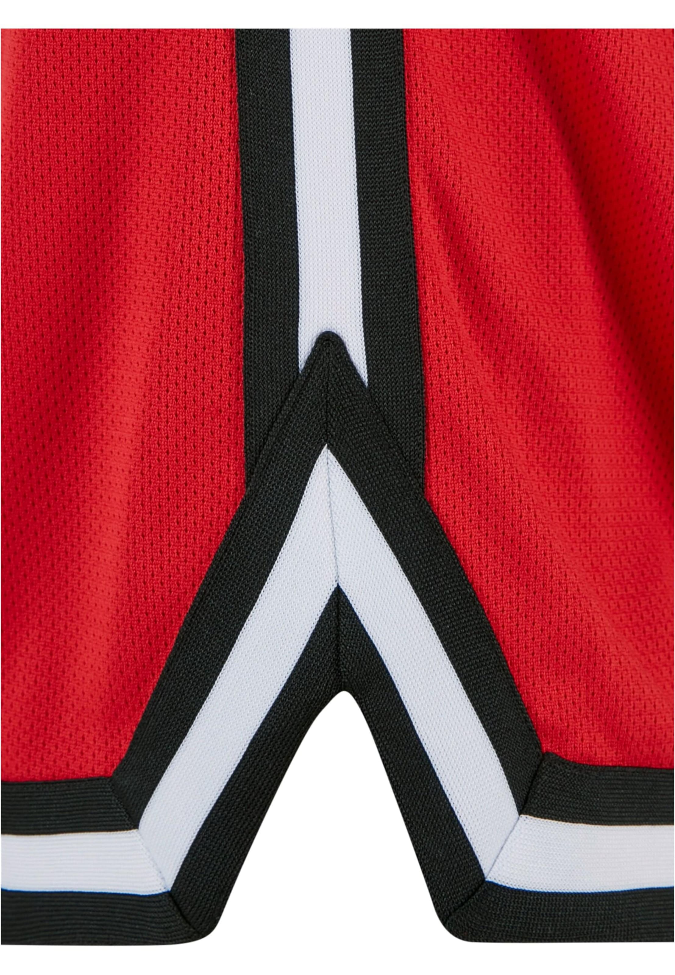 Urban Classics Ohlapna forma Hlače | rdeča barva