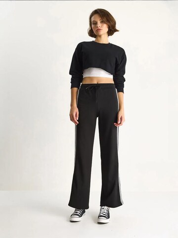 Wide leg Pantaloni di Bianco Lucci in nero