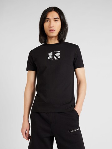 T-Shirt Calvin Klein Jeans en noir : devant