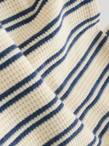 Set Next en bleu