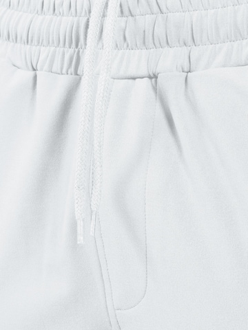 Effilé Pantalon de sport 'Delian' Smilodox en gris