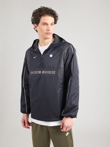 Veste mi-saison Nike Sportswear en noir : devant