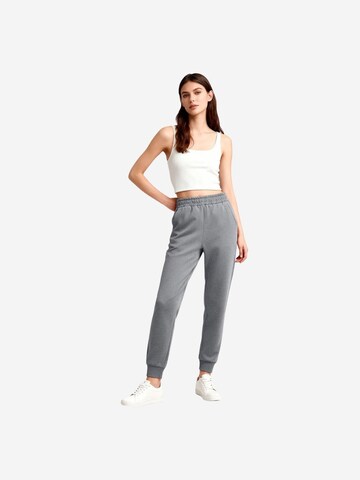 Tommy Life Tapered Sportnadrágok 'Jogginghose' - szürke