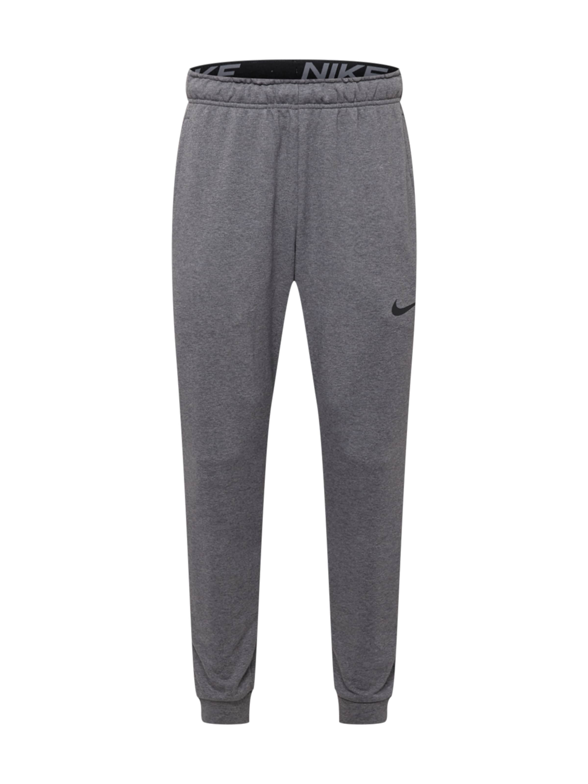 NIKE Tapered Urheiluhousut värissä harmaa: etupuoli