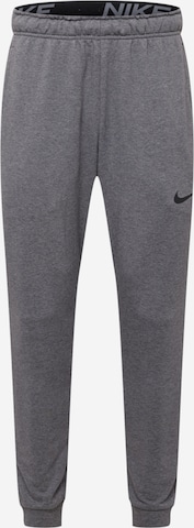 NIKE Sportovní kalhoty – šedá: přední strana