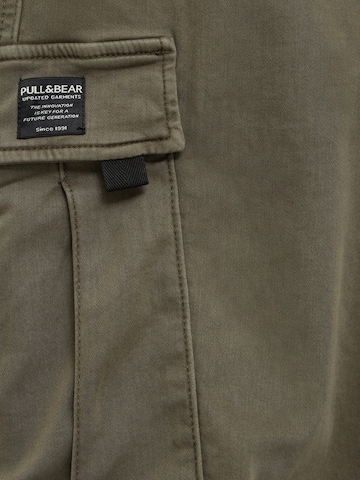 Pull&Bear Regular Cargo trousers in Green