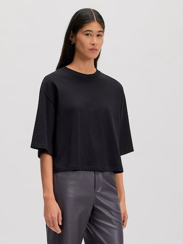 Tricou 'Enzo' de la EDITED pe negru: față