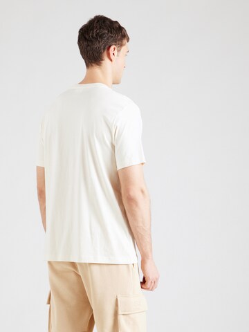 Maglietta di Champion Authentic Athletic Apparel in giallo