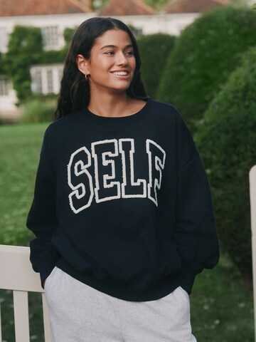 Felpa di self. in nero: frontale