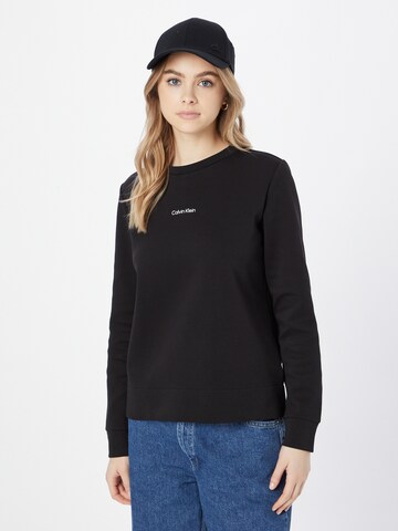 Sweat-shirt Calvin Klein en noir : devant