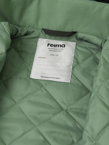 Geacă funcțională de la Reima pe verde