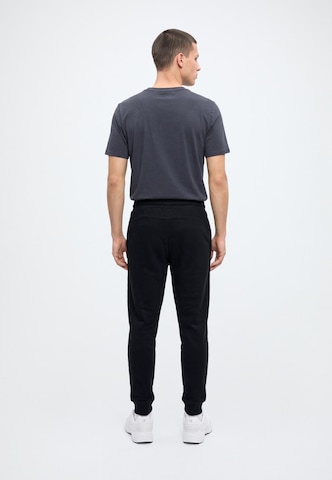 4F - Tapered Pantalón deportivo 'TROUSERS' en negro