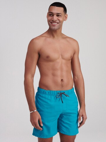 Shiwi Board Shorts in Blue: front