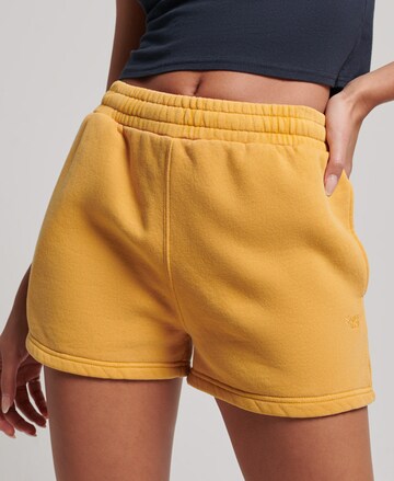 Superdry Regular Pants in Yellow: front