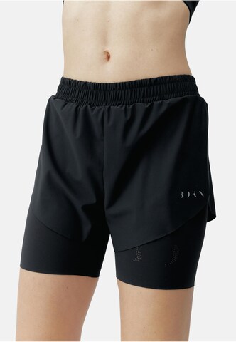 Born Living Yoga Skinny Sports trousers 'Bikila' in Black: front