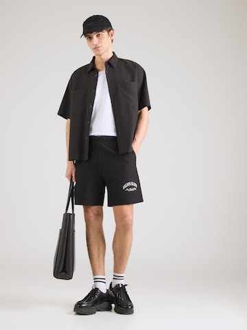 regular Pantaloni di Calvin Klein Jeans in nero