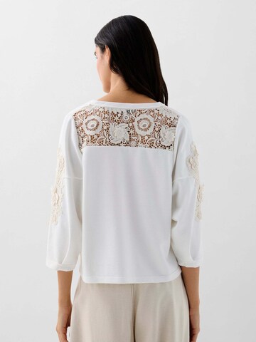 Pull-over ' ' Scalpers en blanc
