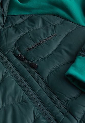 PEAK PERFORMANCE Winter Jacket 'Helium Down' in Green