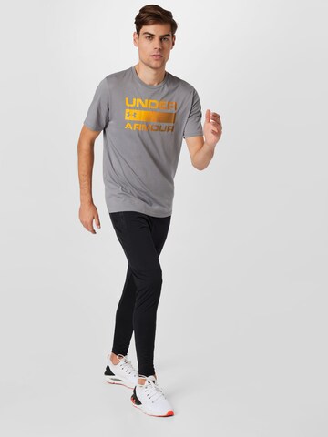 UNDER ARMOURTehnička sportska majica 'Team Issue' - siva boja