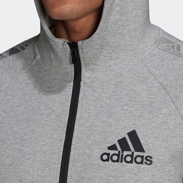 Giacca di felpa sportiva di ADIDAS SPORTSWEAR in grigio