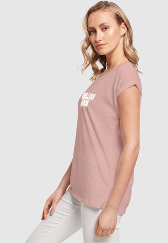 T-shirt 'Rebellious Minds' Merchcode en rose