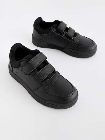 Baskets Next en noir