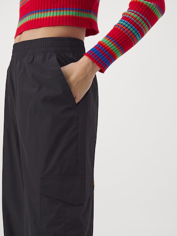 Loosefit Pantalon cargo ALPHA INDUSTRIES en noir